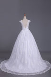 2024 Sexy Wedding Dresses Open Back V Neck A Line Tulle With Applique PSE5S2SN