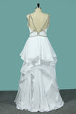 2024 Spaghetti Straps Wedding Dresses A Line With PN22AEJS