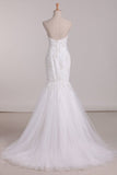 2024 Wedding Dresses Sweetheart Mermaid Tulle With Applique PK5ASXZK