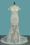 2024 Wedding Dresses Scoop Short Sleeve Mermaid Tulle With Applique PY64DB4C