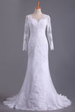 2024 Long Sleeves V Neck Open Back Wedding Dresses Tulle With Applique P8NQRK14