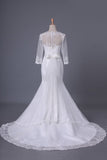 2024 Scoop 3/4 Length Sleeve Mermaid Wedding Dress Tulle With Sash PEMET5DP